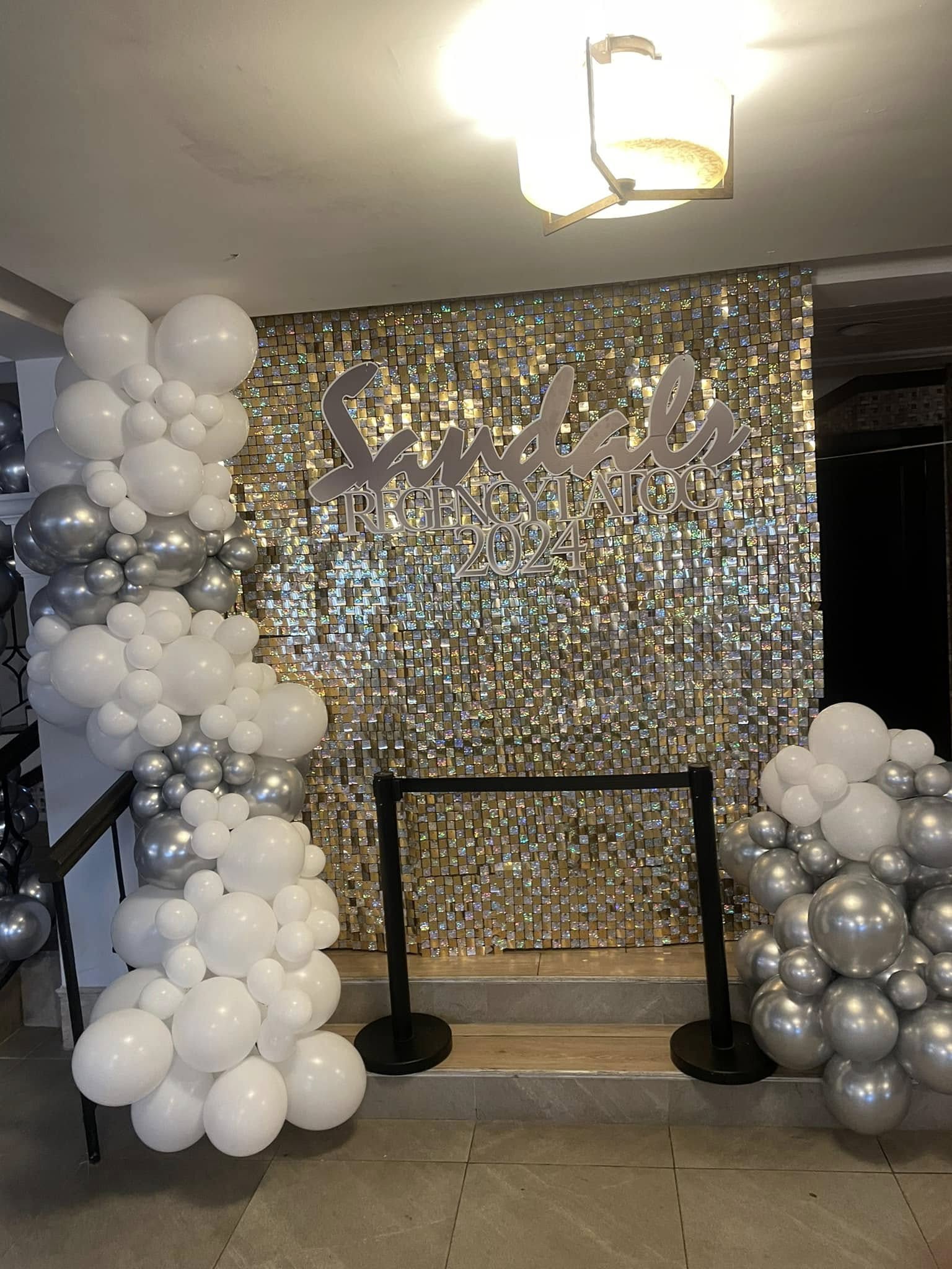 Elegant silver celebration backdrop by Shamack Designs